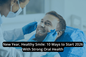 A dentist examines a smiling male patient in a dental chair; text overlay reads, "New Year, Healthy Smile: 10 Ways to Start 2026 With Strong Oral Health." Begin your New Year with tips for maintaining a healthy smile and better oral health.